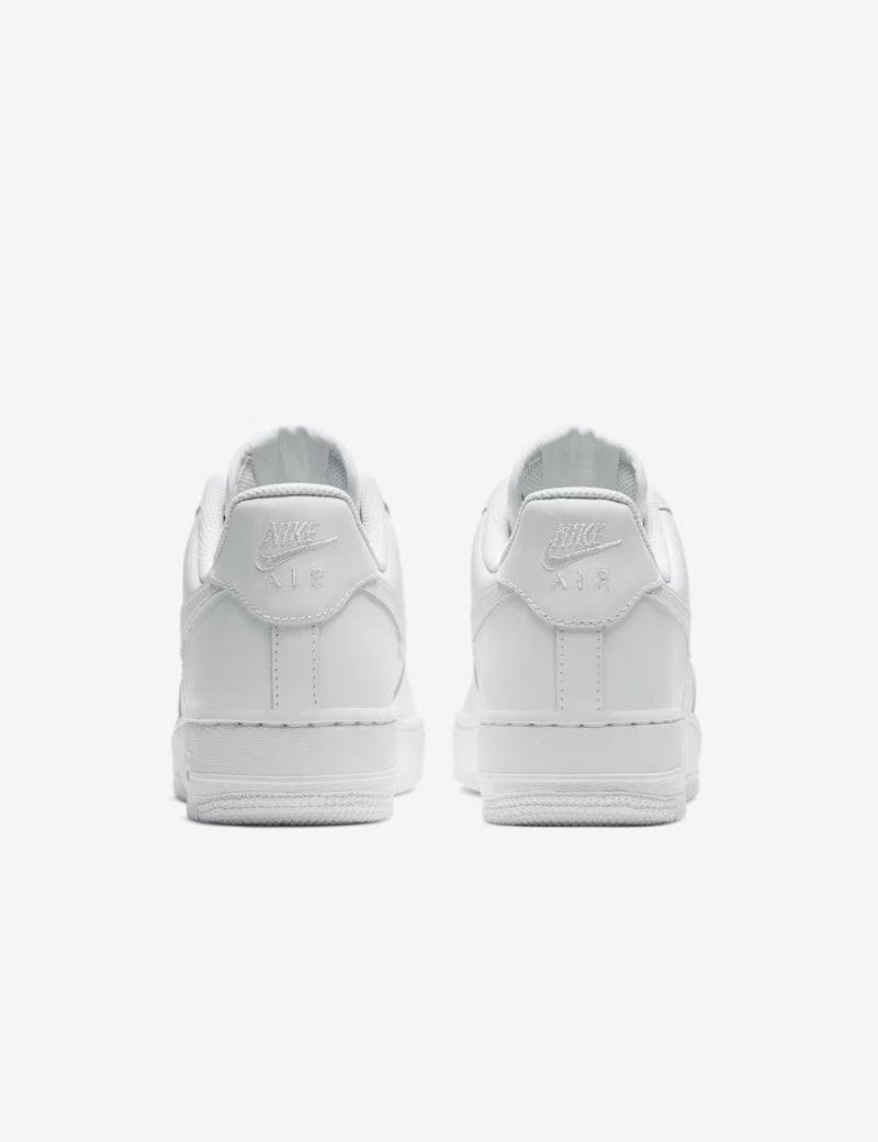 White sneakers with Nike logo on a white background