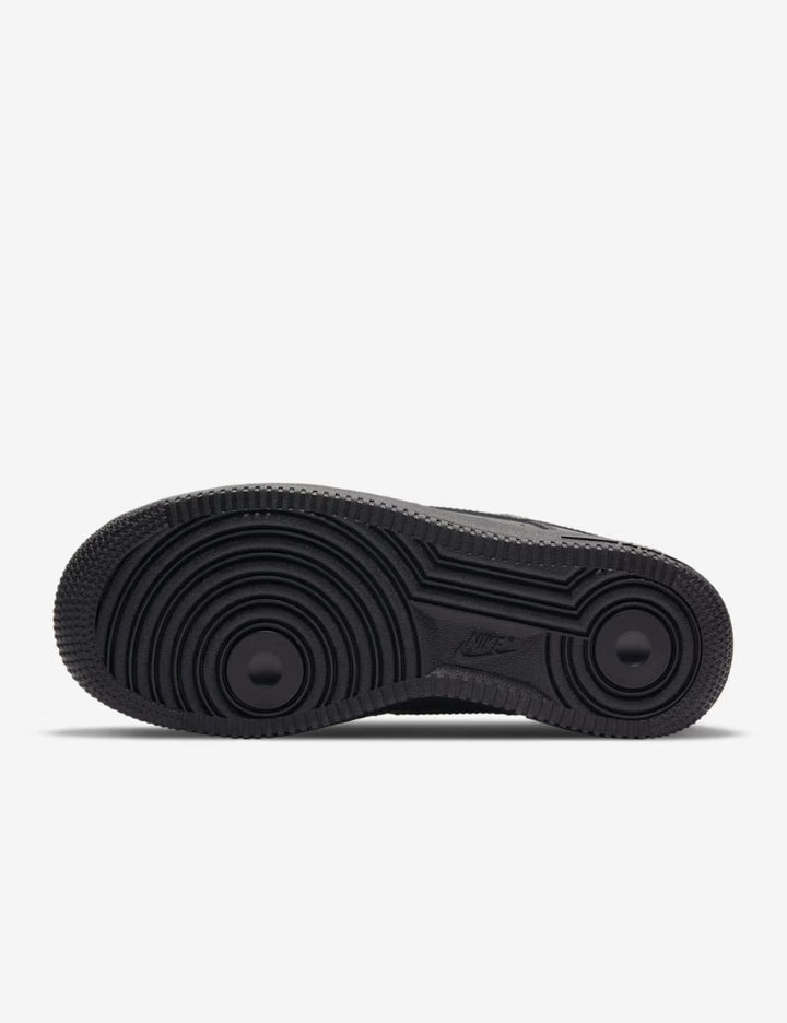 Black sole of a sneaker on a white background