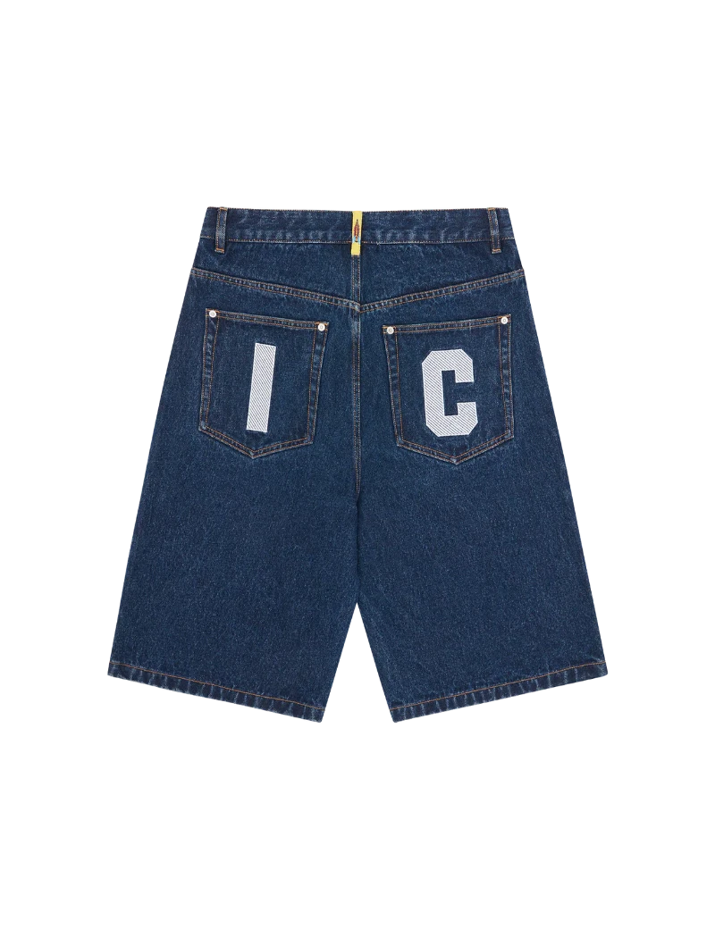 Blue denim shorts with letter 'I' and 'C' on the back pockets against a white background