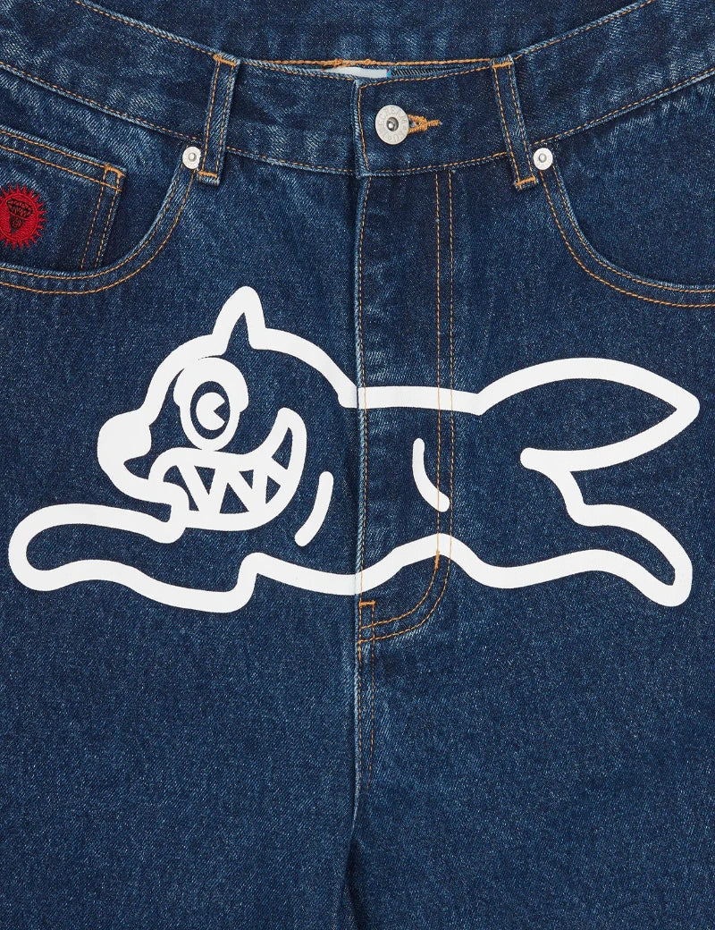 Blue denim jeans with a white graphic design on the back pocket