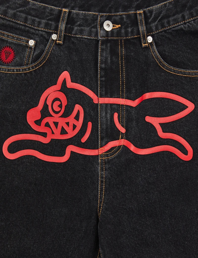 Black denim jeans with red graphic design on the back pocket